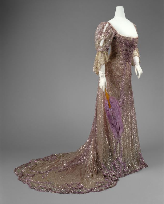 Henriette Favre (French) Evening Dress, 1902 Worn by Queen Alexandra (British, born Denmark, 1844–1925) Mauve silk tulle, sequins The Metropolitan Museum of Art, Gift of Miss Irene Lewisohn, 1937 (C.I. 37.44.1) Photo: © The Metropolitan Museum of Art, by Karin L. Willis